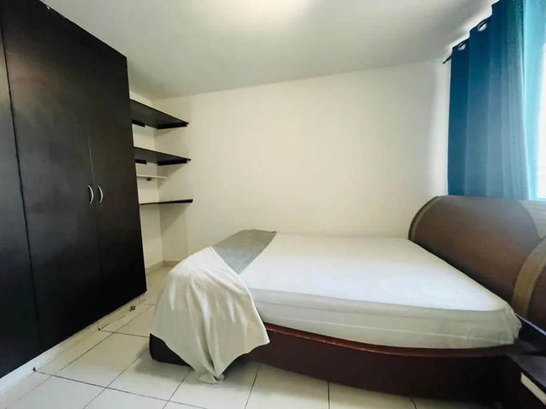 Furnished bedroom with AC and closet at PH Condado Country Club Condado del Rey Panama