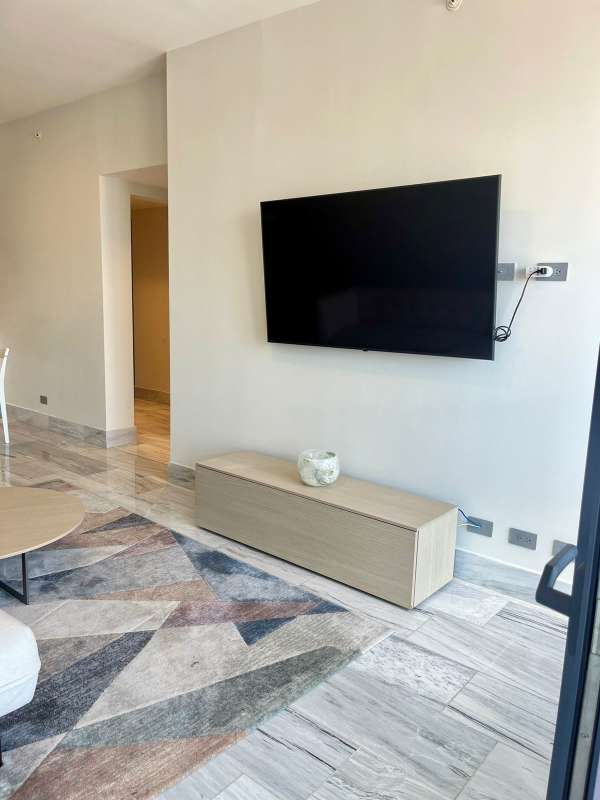 Luxury bedroom with floor-to-ceiling windows, walk-in closet and city skyline ocean views in PH Nuovo Bella Vista