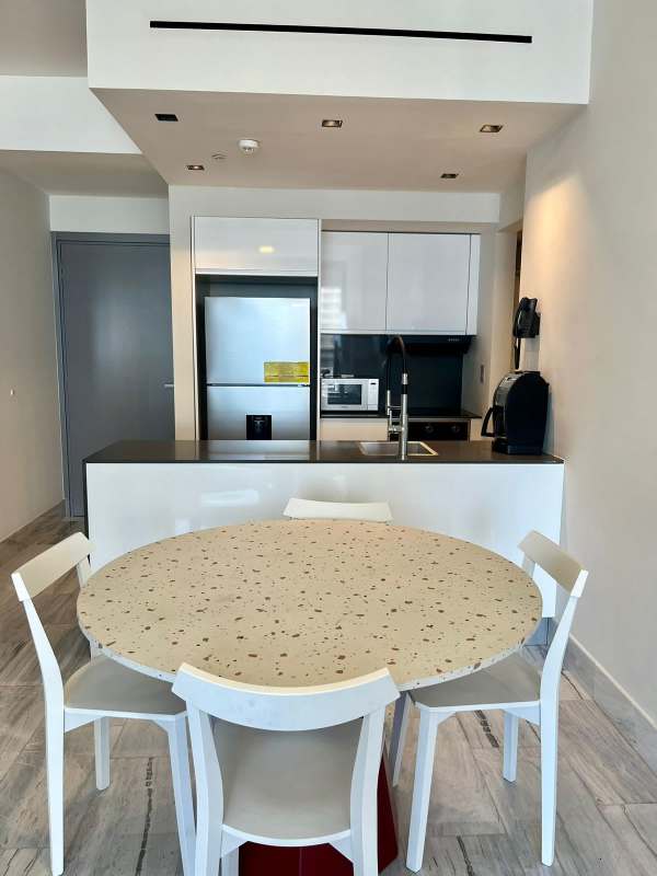 Modern bathroom featuring glass shower enclosure and designer finishes in PH Nuovo Panama