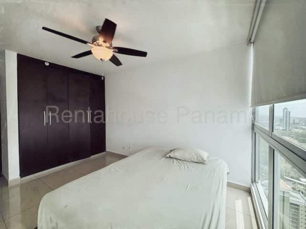 Second bedroom with large window and closet Costa del Este Panama apartment
