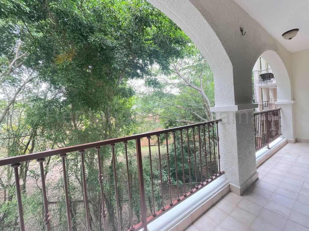 Modern bathroom with glass shower and pedestal sink at Embassy Club Clayton Panama