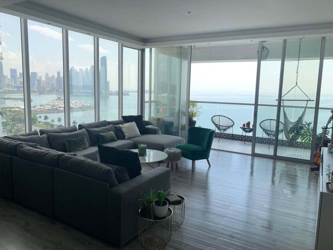 Contemporary living room with windows and balcony PH Rivage Tower Panama