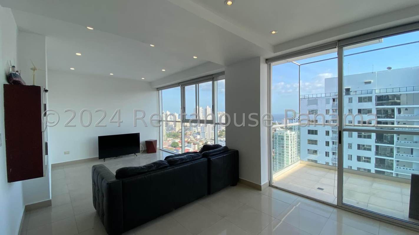 Living room with floor-to-ceiling windows, balcony access, panoramic skyline at PH Vitro Tower Panama City