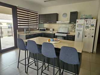 Large balcony with scenic tropical landscape views in River Valley Panama Pacifico apartment