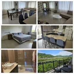 Bright second bedroom with closet, air conditioner, garden views in River Valley Panama Pacifico