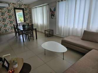 Bedroom with AC, closet, and large windows leading to balcony in River Valley Panama Pacifico