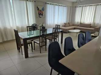 Contemporary kitchen with appliances, breakfast counter, ample cabinets in River Valley Panama Pacifico