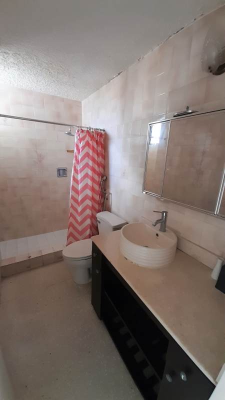 Minimalistic bedroom with wardrobe, bed, neutral colors PH Marfil Obarrio Panama