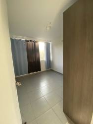 Minimalist bedroom with ceramic flooring, wardrobe and window in PH La Sierra Arraiján Panama