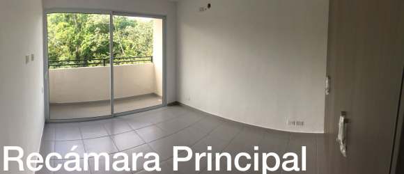 Master bedroom with sliding door to balcony and window view PH La Sierra Arraiján Panama