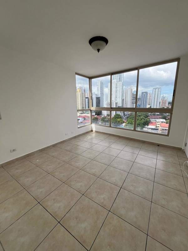 Bathroom with marble countertop vanity, glass shower in Panama apartment