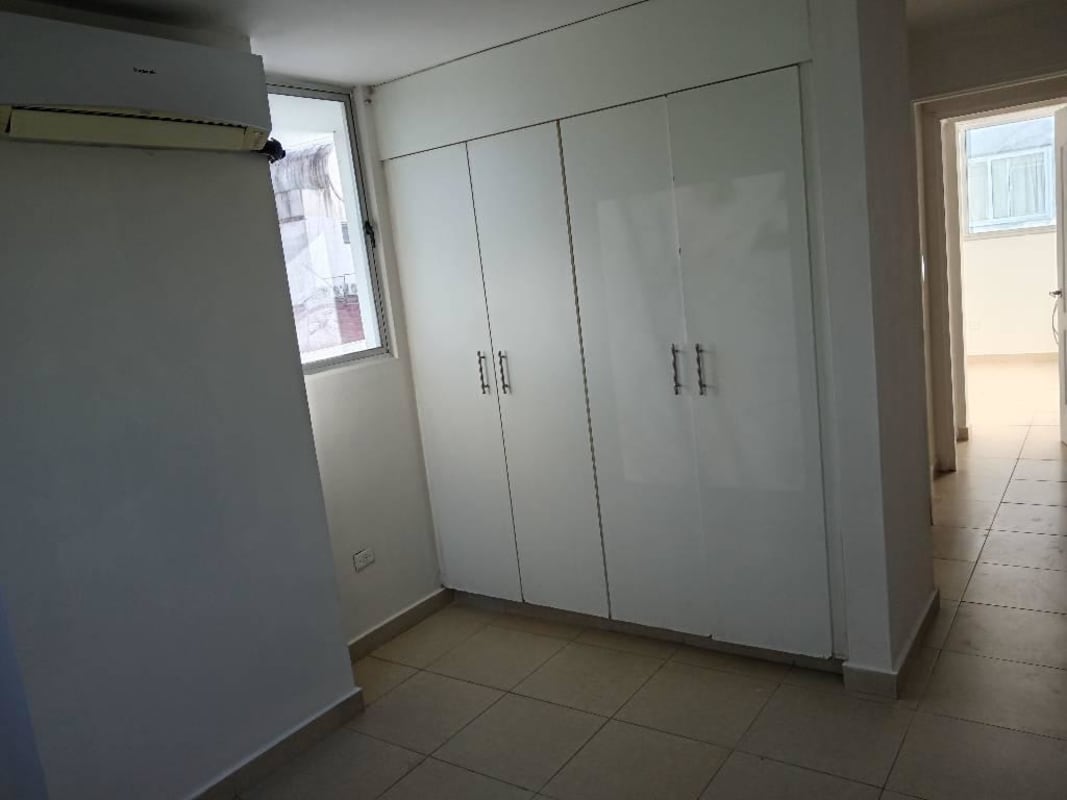 Twin residential towers balconies gated entrance PH Bella Vista Garden Panama City