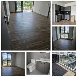 Modern bathroom with glass shower enclosure and vanity at PH Centriqo Panama Pacifico