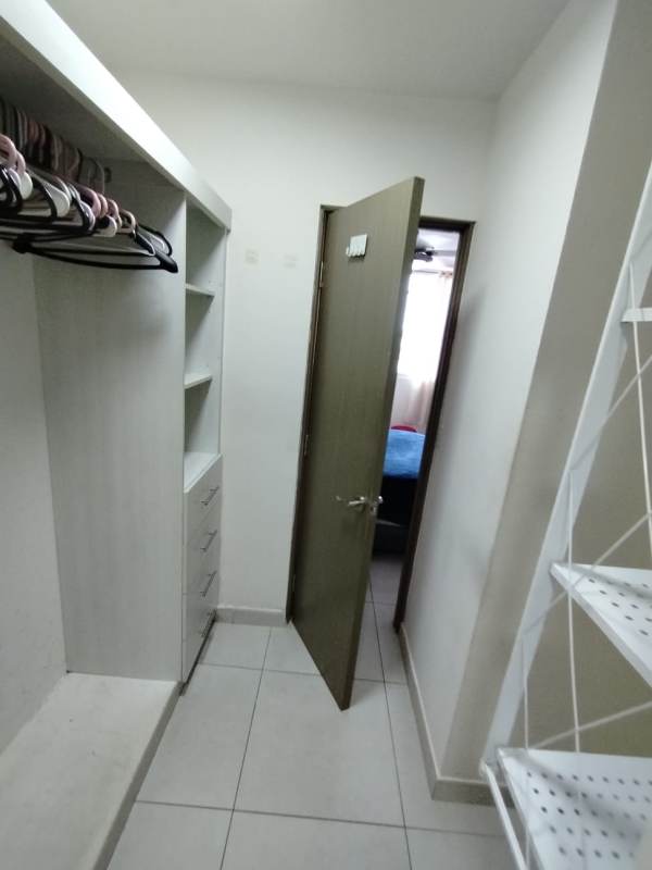 Spacious modern closet with open shelving and drawers at PH Vista Horizonte Panama