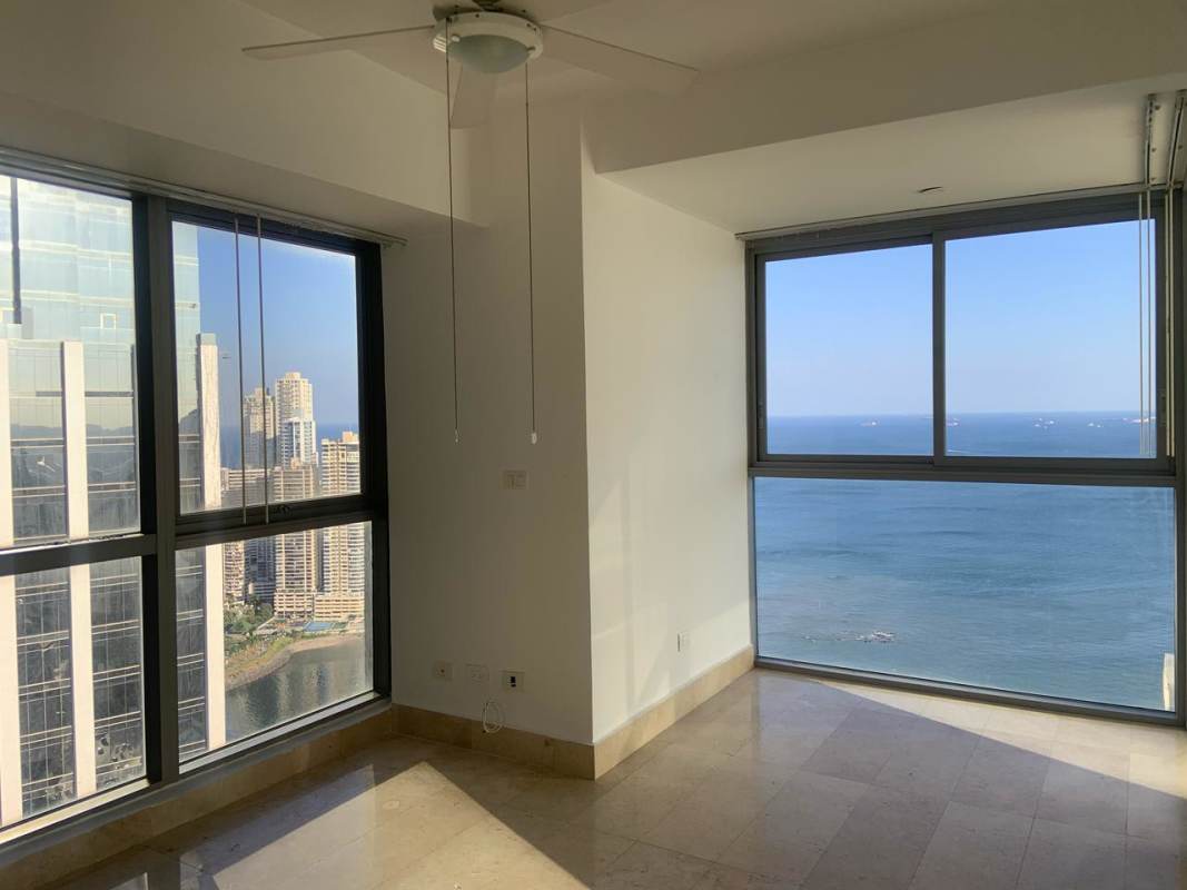 Modern ocean view living room panoramic windows PH YOO Panama Avenida Balboa