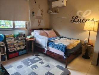 Children bedroom with toys AC friendly decor window blinds in Panama Pacifico house sale