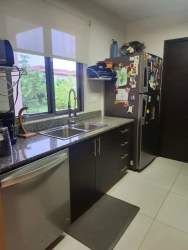 Bedroom with AC built-in closet study desk and balcony access in Woodlands Panama Pacifico