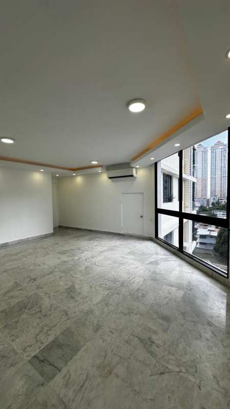 Modern bathroom with marble tiles, walk-in shower and vanity in PH Vista Tower Bella Vista Panama