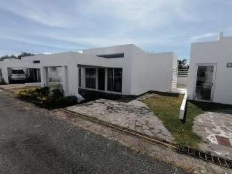 Minimalist single-story home exterior with large windows PH Ibiza Residence Bijao