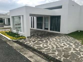 Modern driveway and entrance to white minimalist home Ibiza Residence Playa Bijao