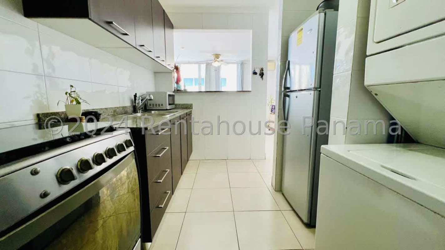 Master bedroom with tile floors and window Edison Park Panama City