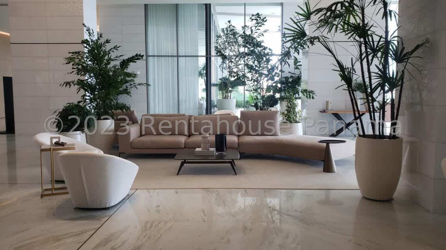 Spacious master bedroom with ocean views, marble floors, and en-suite bath in PH Rivage Panama