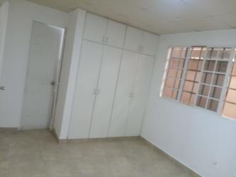 Clean bedroom with closet and tiled floor 4 bedroom home Colon Panama