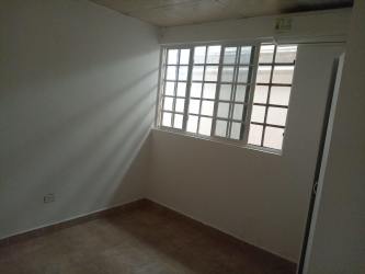 Spacious bedroom with large window and tile in 4-bedroom home Colon Panama