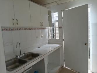 Functional kitchen with tile countertops and cabinets house in San Cristobal Colon Panama