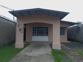 Single-story home with driveway and porch for sale in San Cristobal Colon