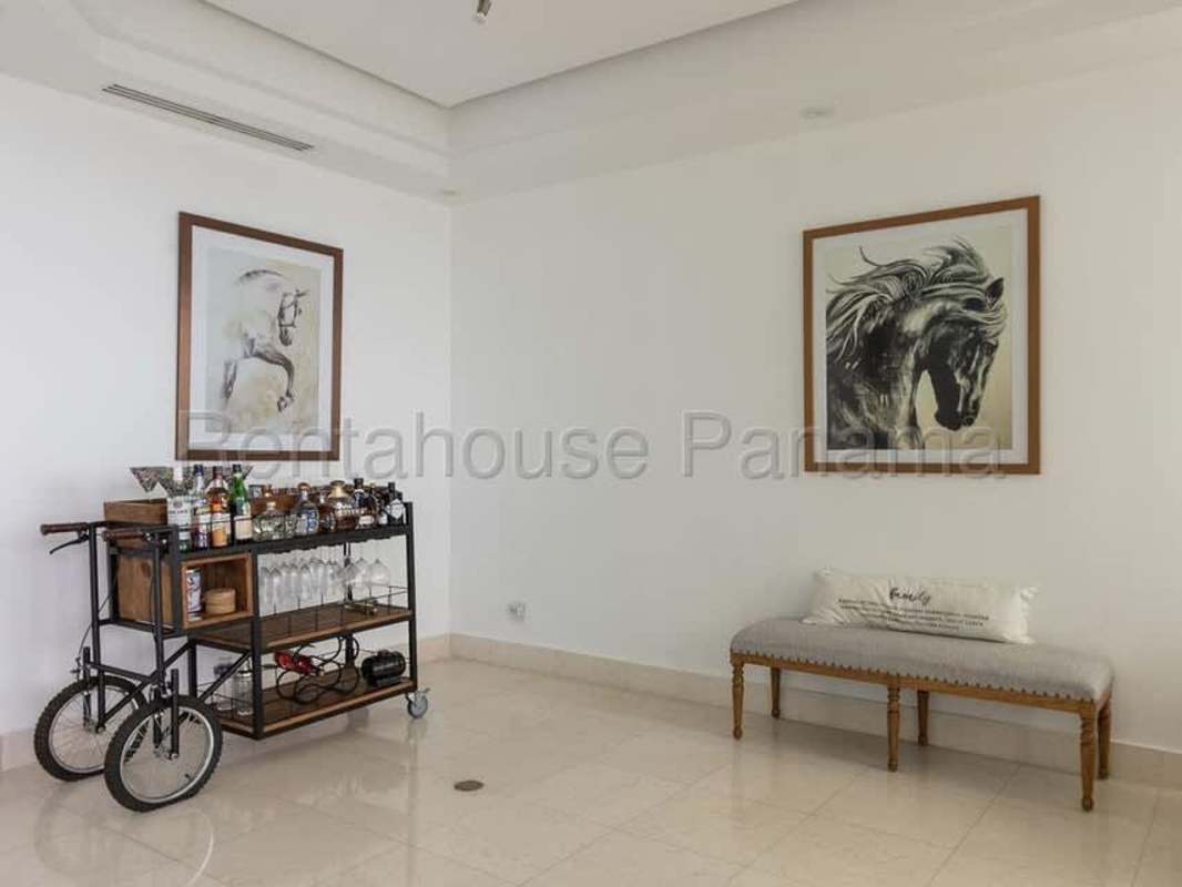 Contemporary kitchen with granite island and premium appliances PH Ocean One Costa del Este Panama