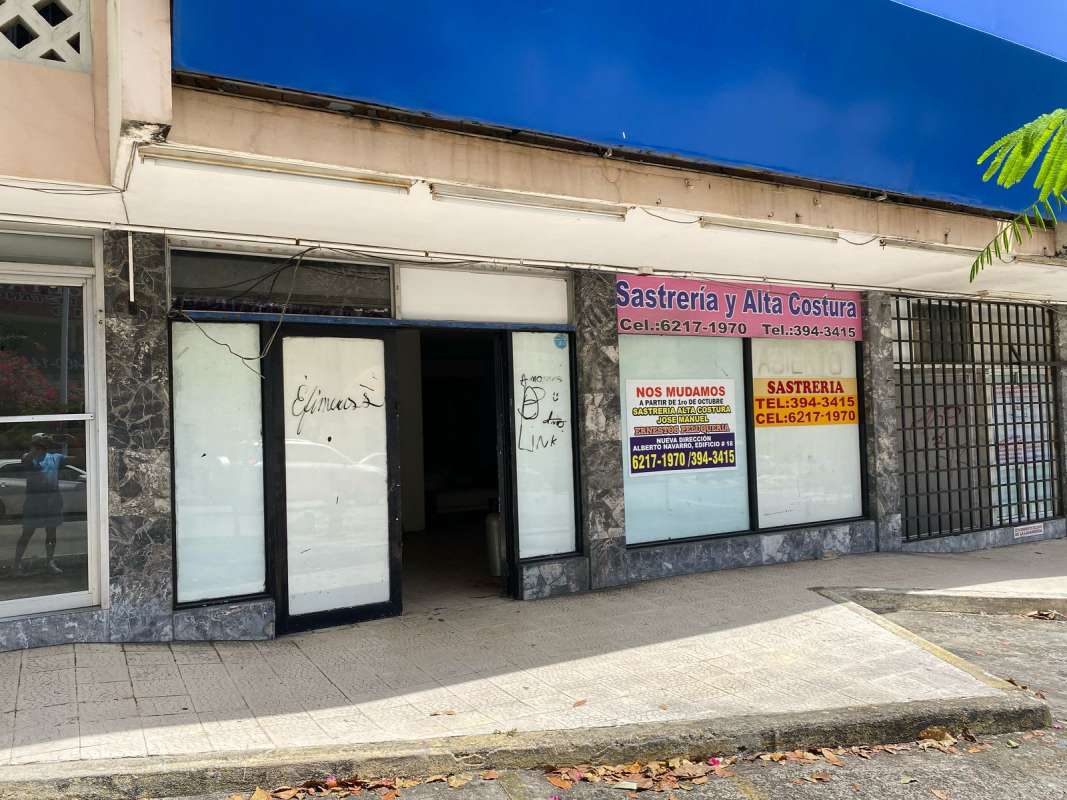 Exterior vacant commercial retail unit with marble trim and signage Vía Argentina Panama