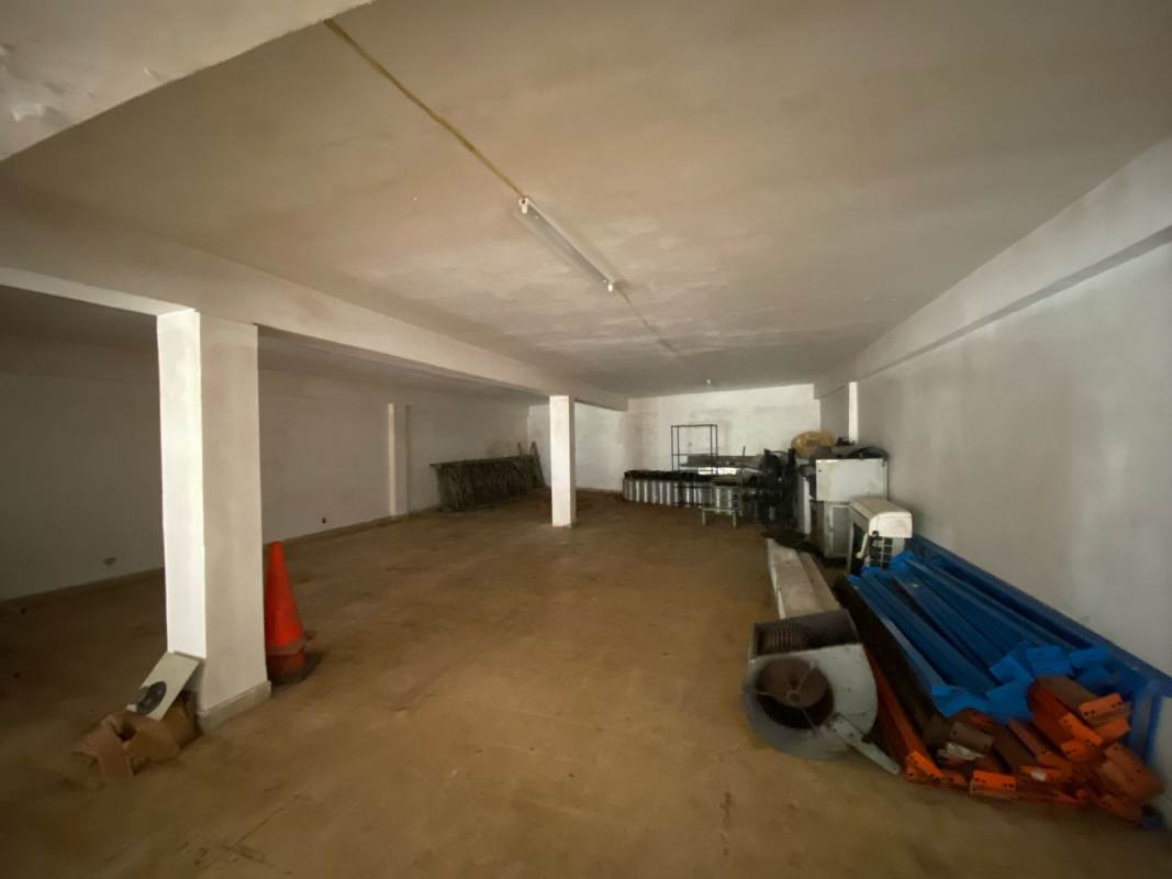 Unfinished storage basement space or back office with concrete floor in PH Distrito Plaza Panama