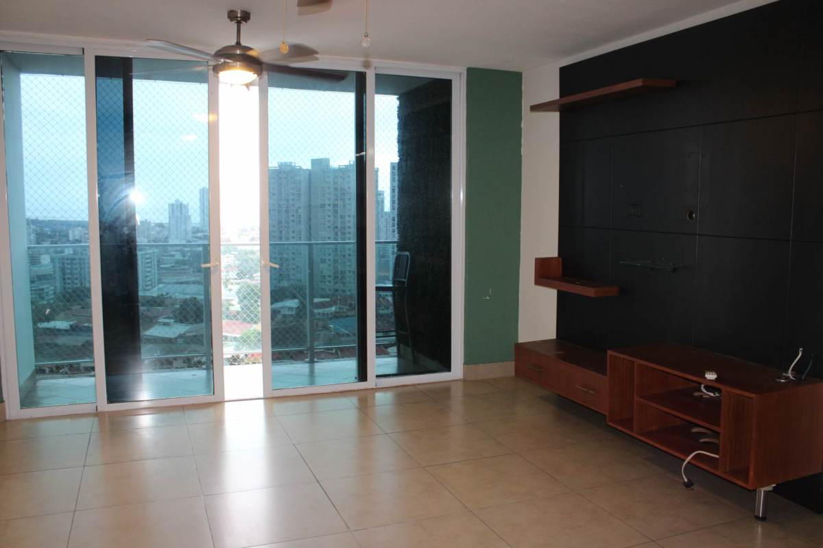 Living dining area with sliding doors to balcony ceiling fan tile floors PH Foresta Tower Hato Pintado Panama City