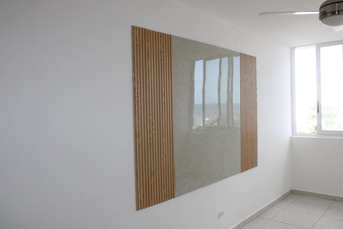 Minimalist bedroom with large window, ceiling fan, bay and city view in PH Bay View Panama City