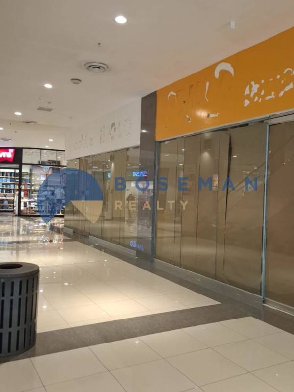 Open commercial area with clear glass walls in El Dorado Shopping Mall Panama