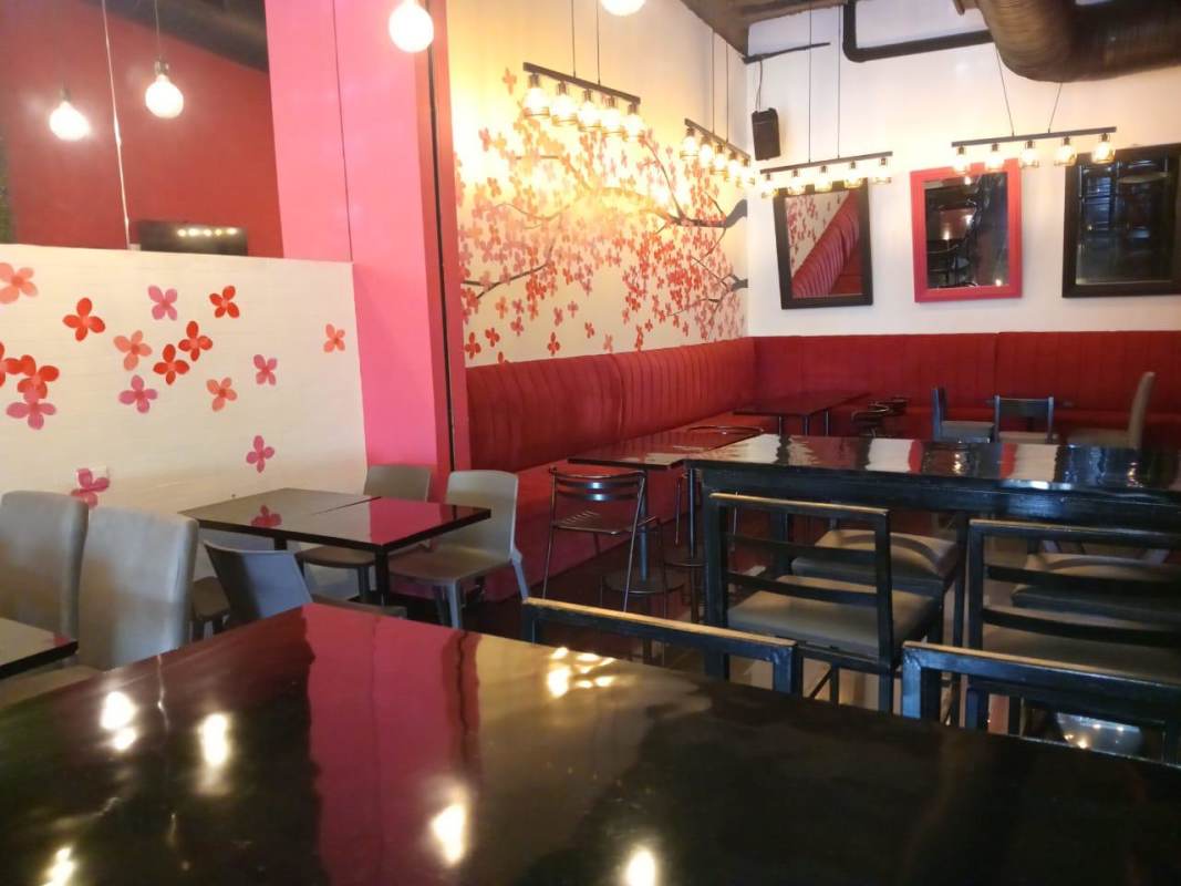 Equipped commercial bar with granite counter, stools, wine rack at PH San Francisco Plaza Panama City