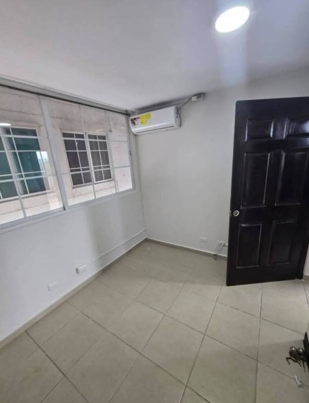 Bedroom with tiled floor AC built-in closet and window Mystic Tower Panama