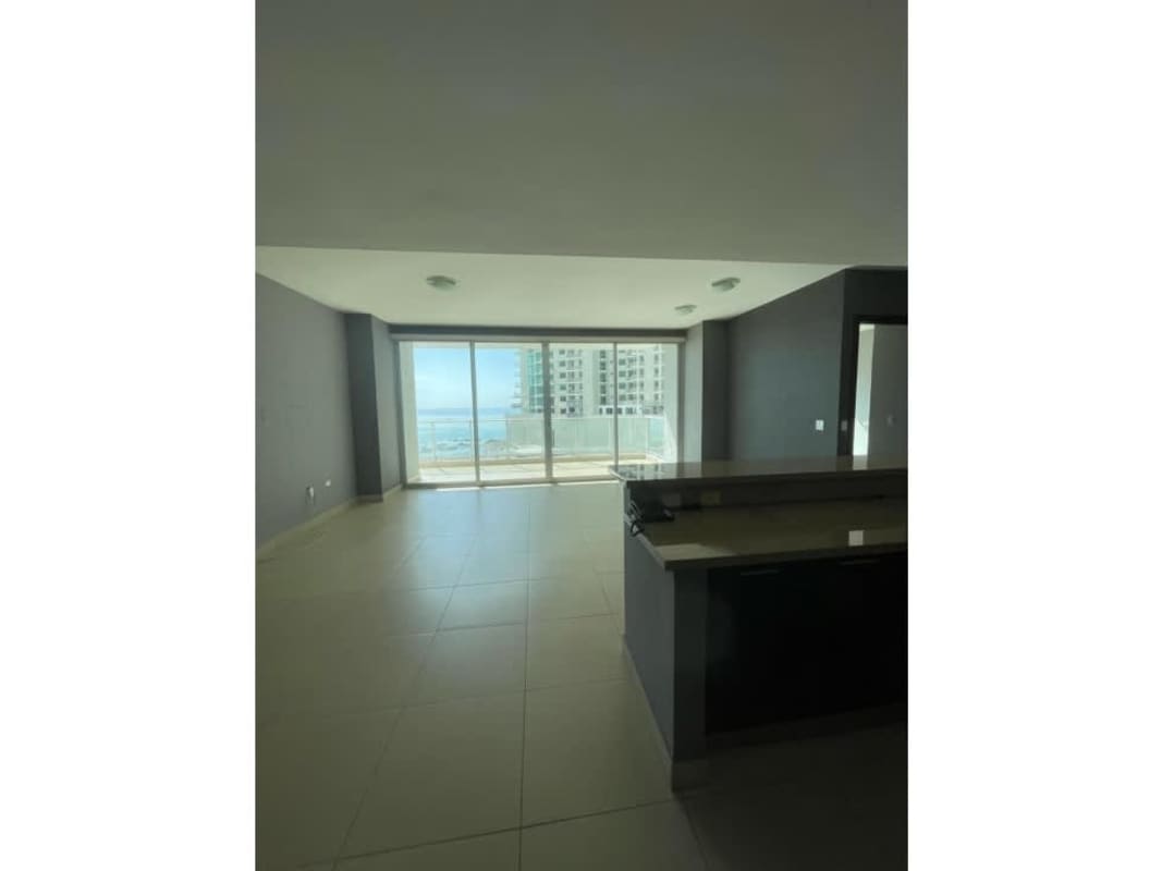 Bathroom with double sink vanity, glass shower, neutral tile at Ocean Park Tower Panama