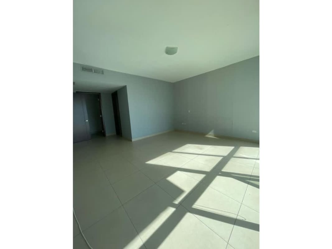 Open plan living room with balcony access overlooking Pacific Ocean Ocean Park Panama