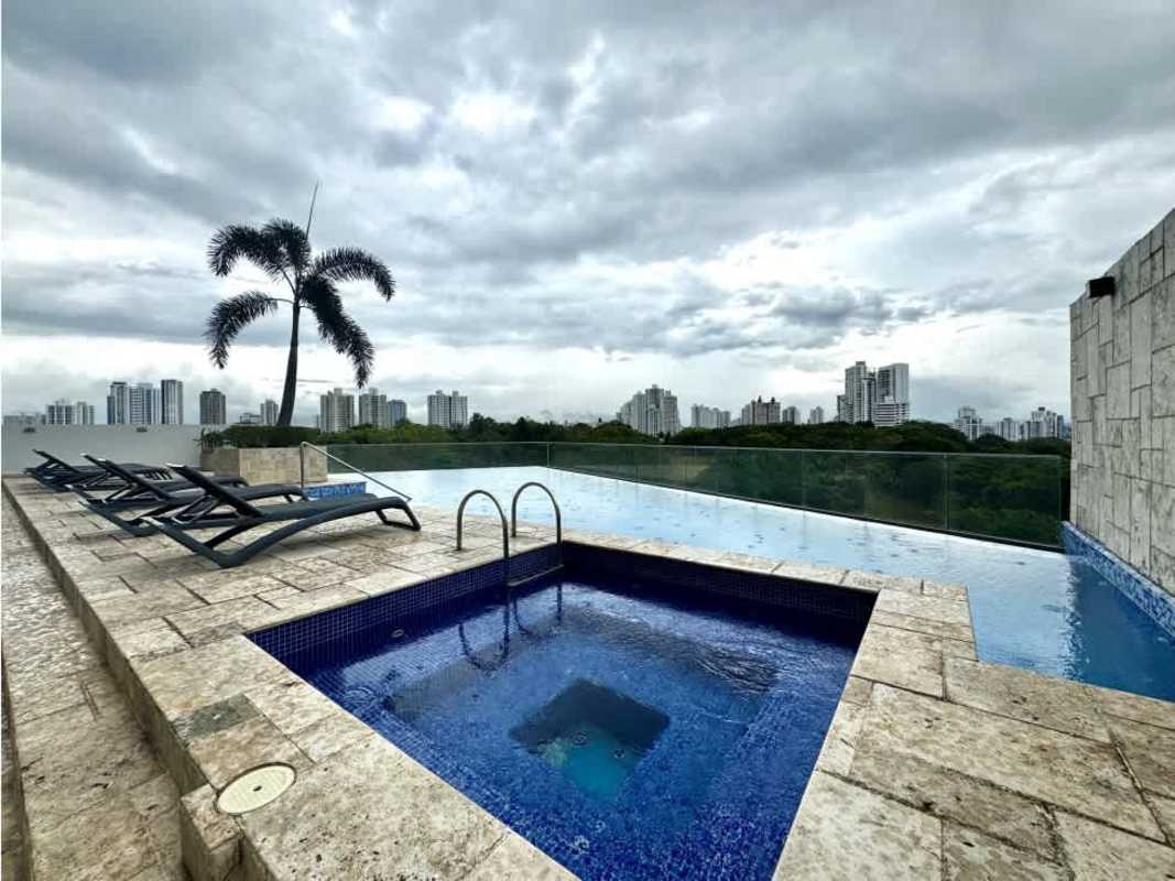 Unfurnished modern living room with large corner windows offering Panama City skyline at PH Tee One