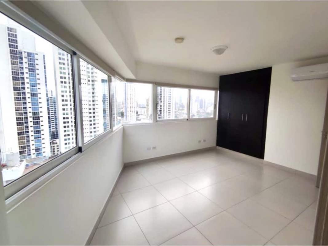 Modern lobby of PH Tee One with abstract art, large windows, stylish furnishings in Panama City