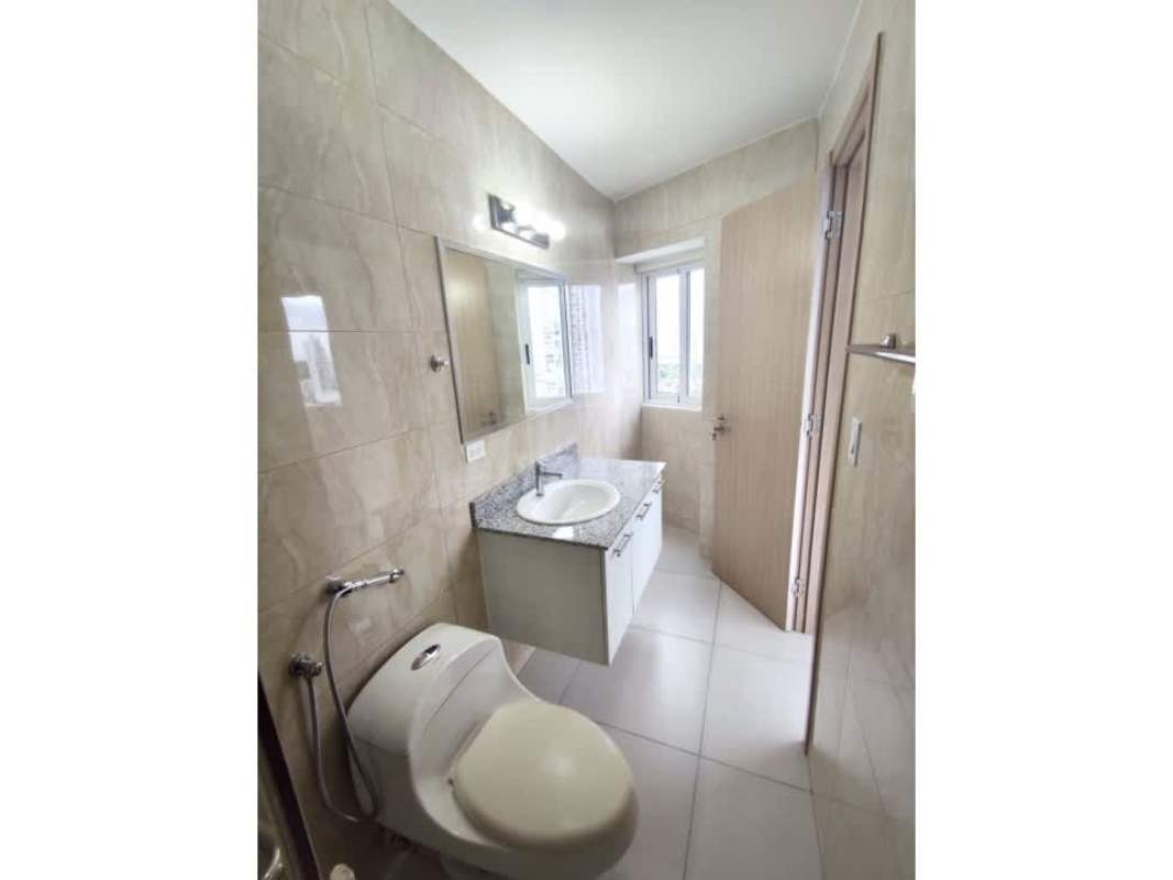 Covered terrace with children's playground and seating overlooking Panama skyline in PH Tee One