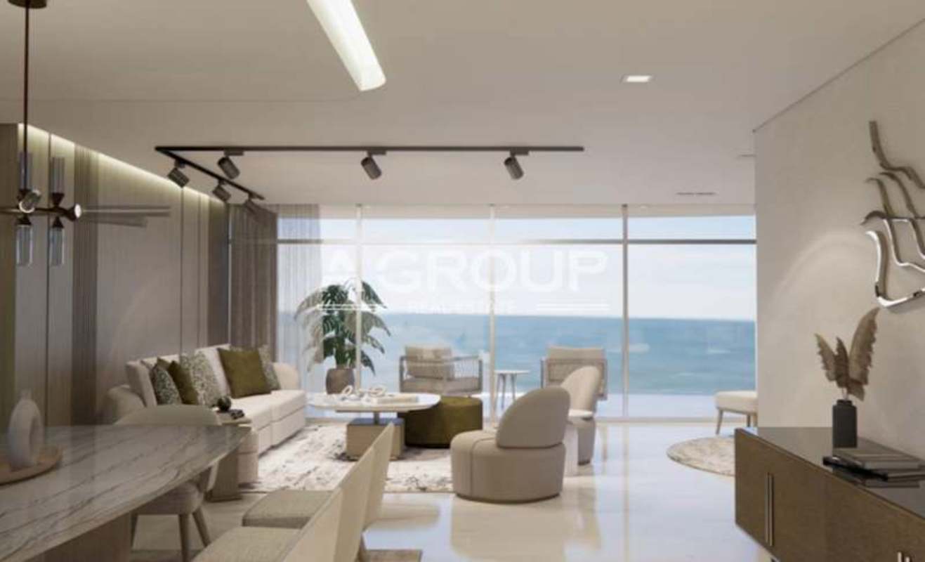 Modern living and dining room with panoramic ocean view windows in Allure Punta Pacifica Panama