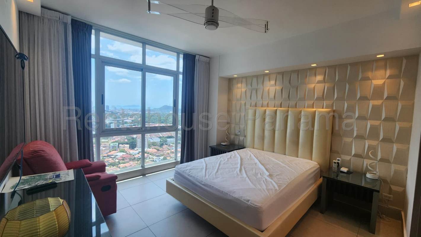 Bright living room with balcony access, Canal views, modern furniture at PH Pacific Hills Elite Dos Mares Panama