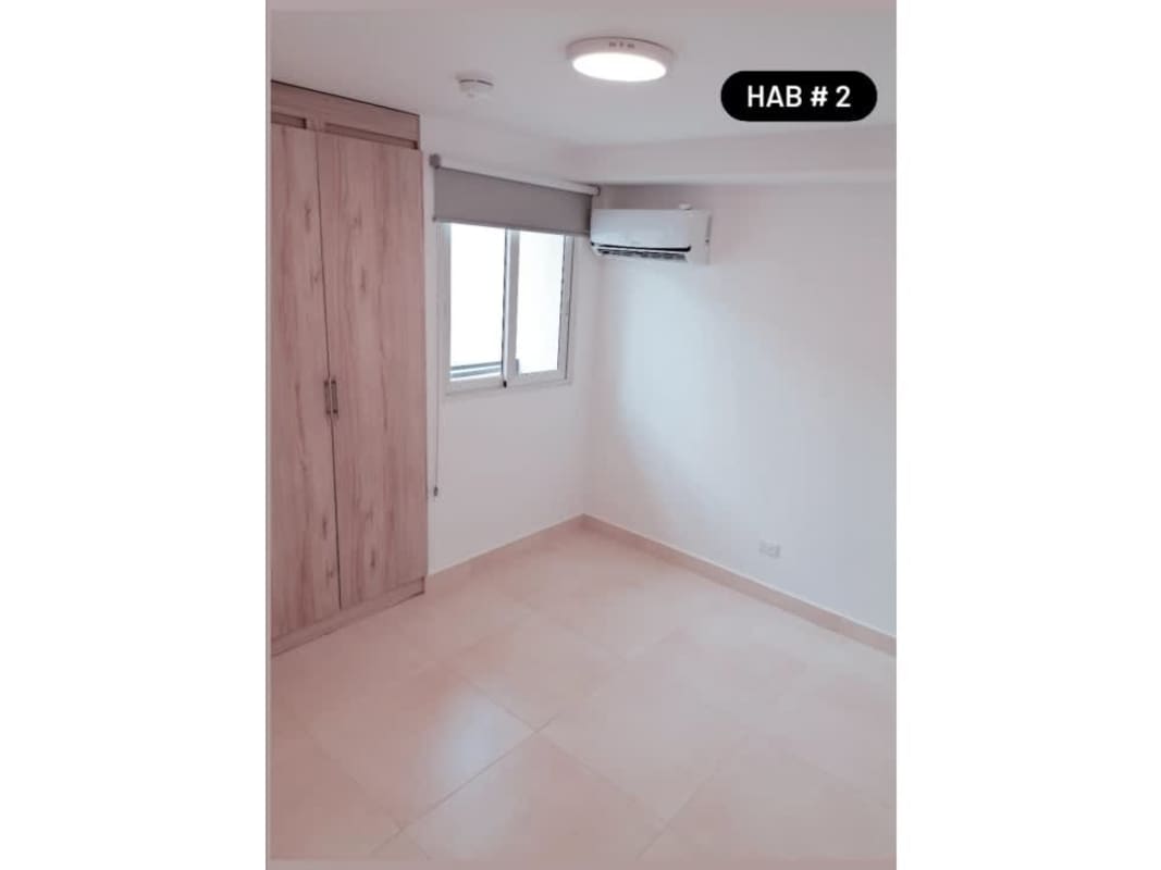 Minimalist second bedroom with window, closet in Panama Viejo Residences apartment