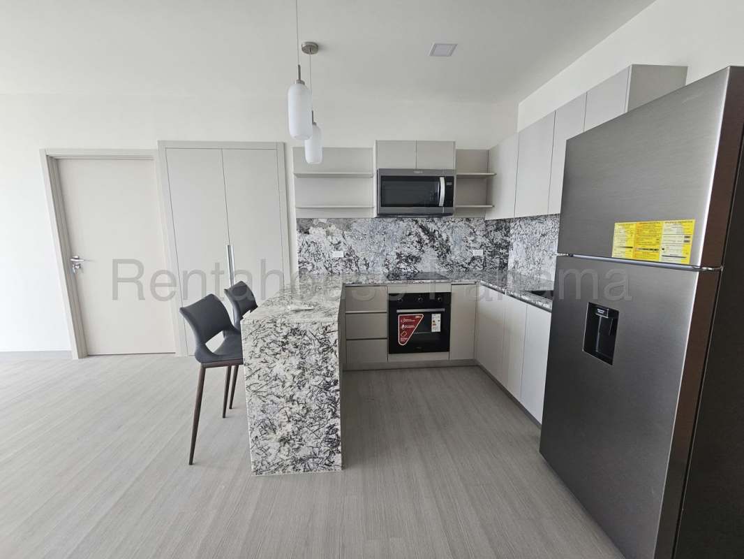 Granite countertop kitchen at PH Arcadia apartment in Costa del Este Panama City.