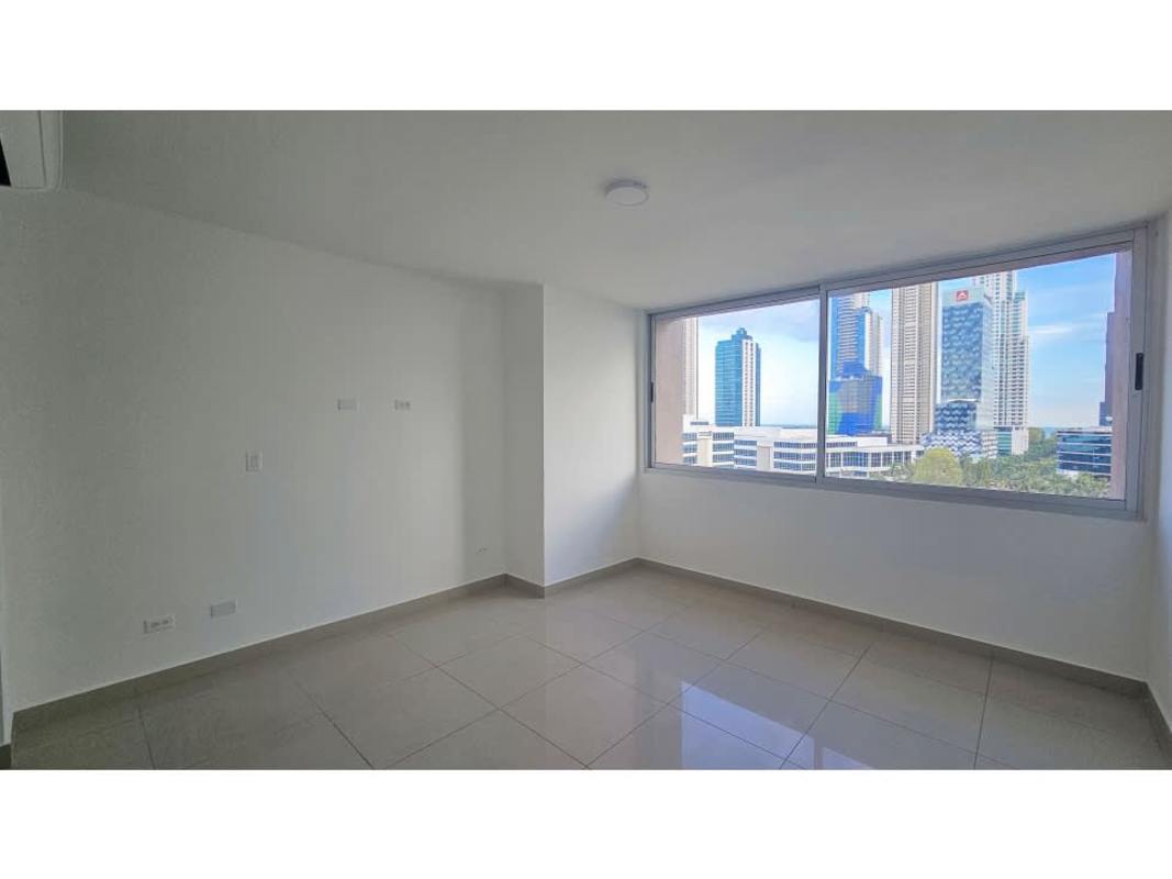 Master bedroom with large window and ocean/city skyline views Costa del Este Premier