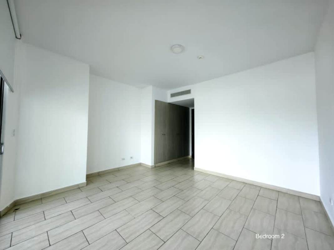 Contemporary open kitchen with stone countertops, high-end appliances, Grand Tower Punta Pacifica Panama