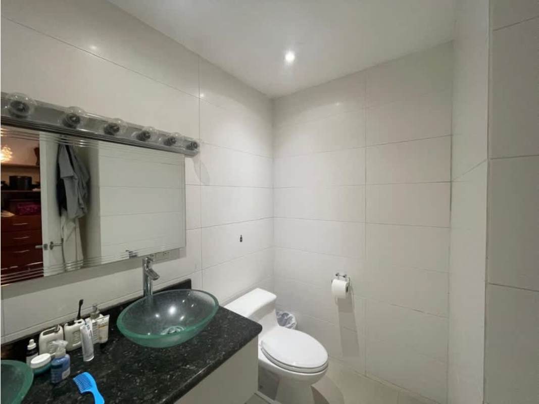 Modern bathroom with granite countertop and vessel sink in home for rent El Carmen Panama
